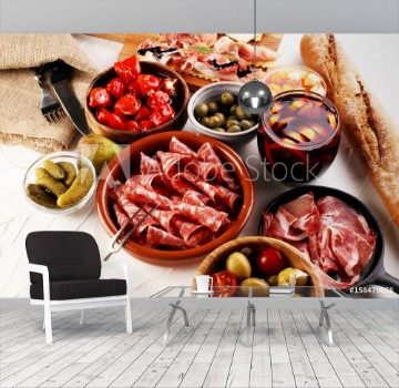 Picture of Spanish tapas and sangria on wooden table - mediterran antipasti set